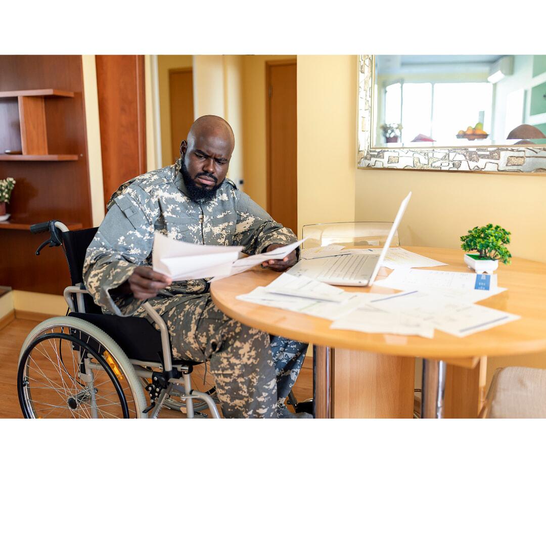 Man in wheelchair looking confused