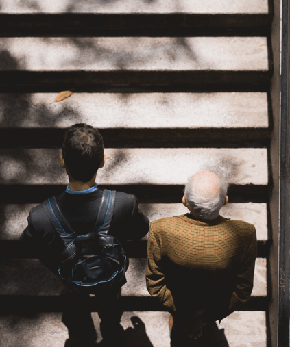 people walking up steps